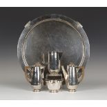 An Arts and Crafts style silver harlequin coffee set with hammered decoration and applied