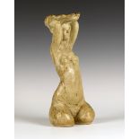 A Frank Stett studio pottery figure of a female nude holding a shell aloft, signed and dated 1975 to