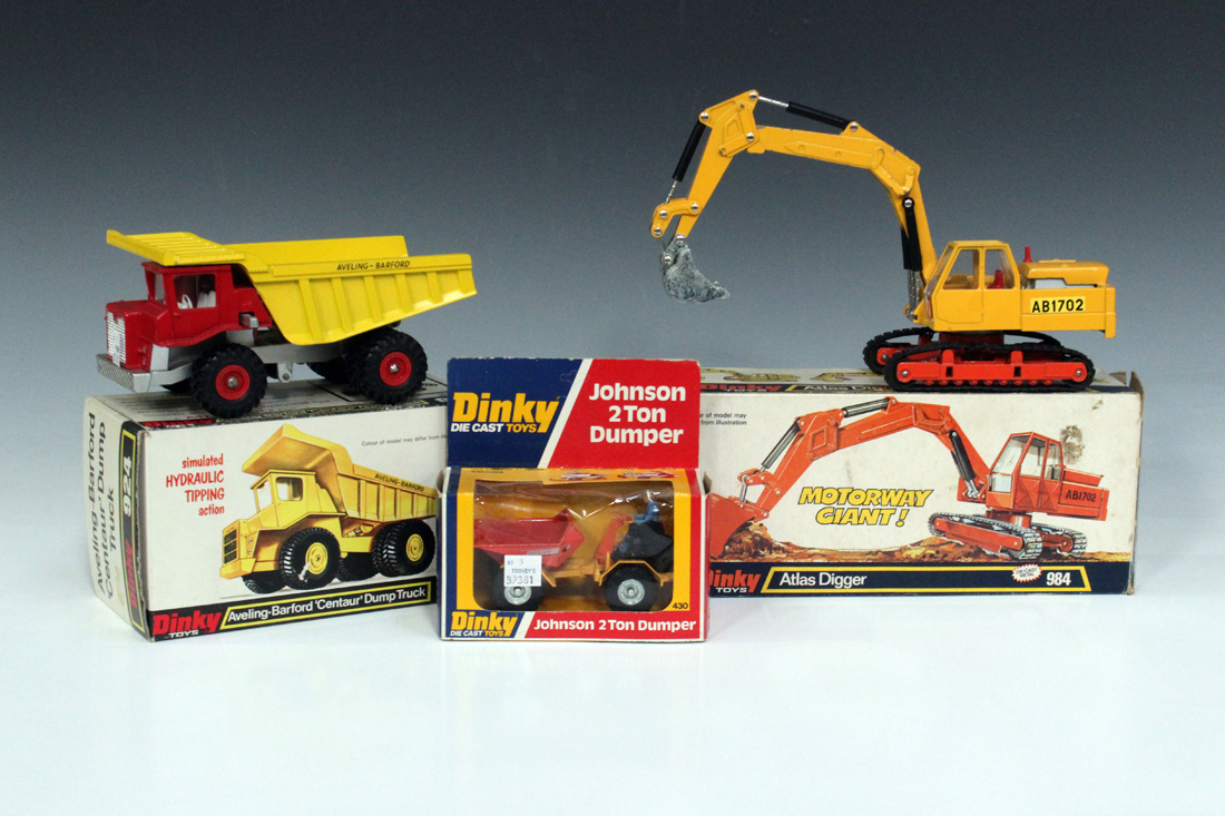 A Dinky Toys No. 430 Johnson 2-ton dumper, within a window box, a No. 963 road grader, within a