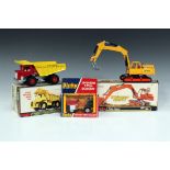A Dinky Toys No. 430 Johnson 2-ton dumper, within a window box, a No. 963 road grader, within a