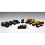 Five Dinky Toys No. 25f market gardeners' lorries, four 25a open wagons and a 25b covered wagon, all
