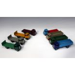 Three Dinky Supertoys No. 511 Guy 4 ton lorries, first type cabs, two No. 512 Guy flat trucks, first