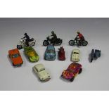 A collection of die-cast vehicles, including Matchbox 1-75 vehicles, a Spot-On BMW Isetta and