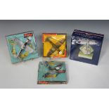 Four Dinky Toys aircraft, comprising a No. 718 Hawker Hurricane MkIIc, a No. 734 P47 Thunderbolt,