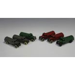 Six Dinky Toys No. 25d tankers with open chassis, comprising two 'Pool', two finished in green and