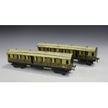 Four Bowman gauge O 1st/3rd coaches no. 10152, finished in brown and cream livery, and a Bowman