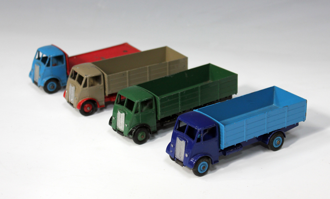 Three Dinky Supertoys No. 511 Guy 4 ton lorries, first type cabs, two No. 512 Guy flat trucks, first - Image 2 of 3
