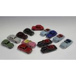 Thirteen Dinky Toys cars, comprising six No. 106 Austin Atlantics, two No. 161 Austin Somersets,