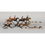 A small collection of Britains hunting figures, comprising three huntmasters, a huntsman, three