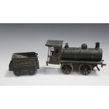 A Carette gauge 1 tinplate clockwork 0-4-0 locomotive no. 296, finished in black livery, together