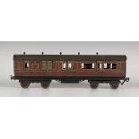 A Bing gauge II 3rd class/brake coach no. 2783, finished in LMS maroon livery (some playwear,