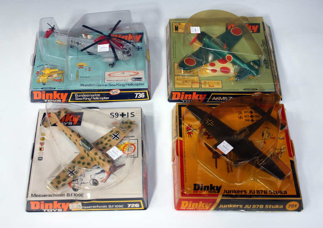 Four Dinky Toys aircraft, comprising a No. 721 Junkers JU 87B Stuka, a No. 726 Messerschmitt B.F