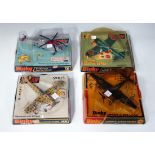 Four Dinky Toys aircraft, comprising a No. 721 Junkers JU 87B Stuka, a No. 726 Messerschmitt B.F