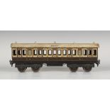 A Marklin gauge II 3rd/1st class coach no. 1153, finished in L and NWR brown and cream livery (
