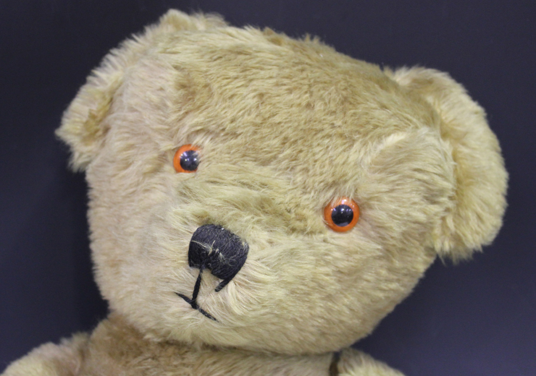 A mid-20th Century large mohair teddy bear with amber and black eyes, stitched snout and jointed - Image 2 of 2