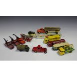 Eleven French Dinky Toys commercial and army vehicles, comprising a No. 36a Willéme log lorry, a No.