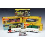An Athearn gauge HO F7 diesel locomotive, finished in NH white and orange livery, a matching van, an