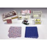 A collection of mostly modern doll's house accessories and furniture, including a four post bed, a