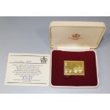 A 22ct gold replica postage stamp ingot commemorating 'Passenger Railway 150th Anniversary 1825-