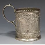 A Victorian silver christening mug of cylindrical form, decorated in relief with classical figures