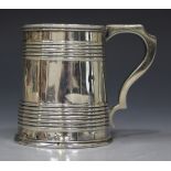 A George III silver christening tankard, the tapered cylindrical body with two ribbed bands and