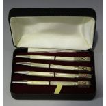 A set of four silver bridge pencils, Birmingham 1994 by William H. Manton, cased. Buyer’s Premium