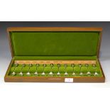 A set of twelve Royal Horticultural Society silver collectors' spoons, each with a different