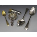 A George III silver tablespoon with bright cut engraved decoration, London 1799 by George Burrows,