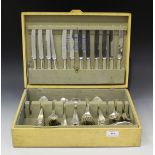 An American sterling part canteen of cutlery with reeded and cut cornered tapering handles,