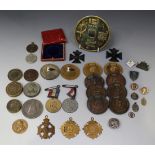 A collection of base metal medallions, including eight Royal Ocean Racing Club uniface medallions,