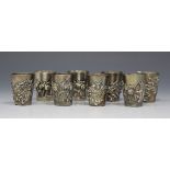 A set of eight Japanese sterling shot measures, each of tapering cylindrical form, decorated in