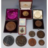 A collection of ten mostly bronze medallions, including 'Calcutta International Exhibition 1883-