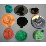 A quantity of mainly mid-20th century ladies' hats and a group of gloves. Buyer’s Premium 29.4% (