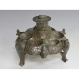 A Khorasan bronze lamp base/incense burner, possibly 12th/13th century, the hexagonal outline with