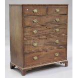 A late George III mahogany chest of two short and four graduated long drawers, on shaped bracket