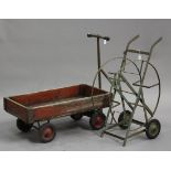 A mid-20th century wood and cast iron mounted garden trolley, length 100cm, together with a mid-20th