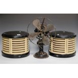 A pair of HMV electric fan heaters of curved form, width 34cm, together with an early 20th century