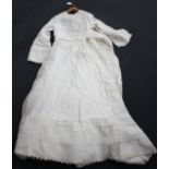 A mid-20th century brushed white fabric wedding dress with broderie anglaise collar, double cuffs