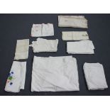 A collection of whitework, mainly early 20th century linen tablecloths. Buyer’s Premium 29.4% (