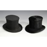 A black top hat by Lincoln Bennett & Co and a collapsible top hat, both cased within a hatbox marked