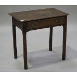 A George III oak lowboy, the moulded top above a drawer, raised on chamfer block legs, height