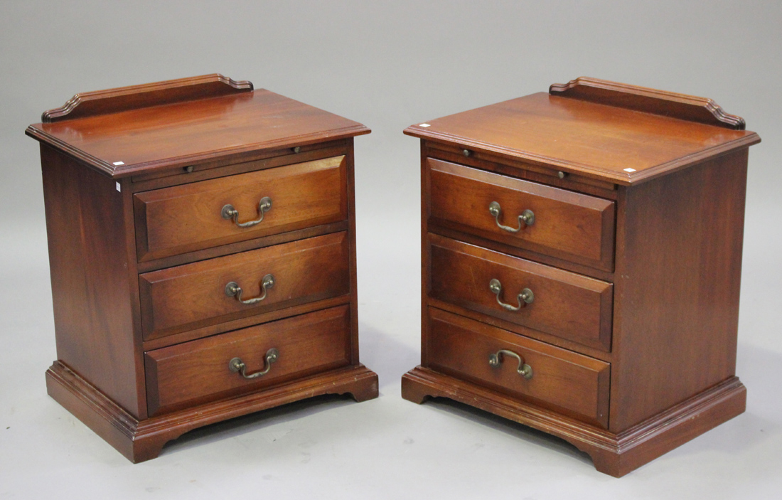A 20th century reproduction hardwood bedroom suite, retailed by Harrod's, comprising a chest of