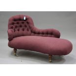 A Victorian chaise-longue, upholstered in red fabric, raised on turned legs, height 88cm, width