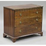 A late 19th century George III style mahogany chest with boxwood stringing, fitted with a brushing
