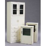 A mid-20th century cream painted kitchen side cabinet, fitted with cupboards and drawers, height