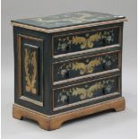 A 20th century painted chest of three drawers, raised on bracket feet, height 70cm, width 73cm.