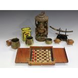 A group of collectors' items, including an early 20th century Japanese model of a katana and
