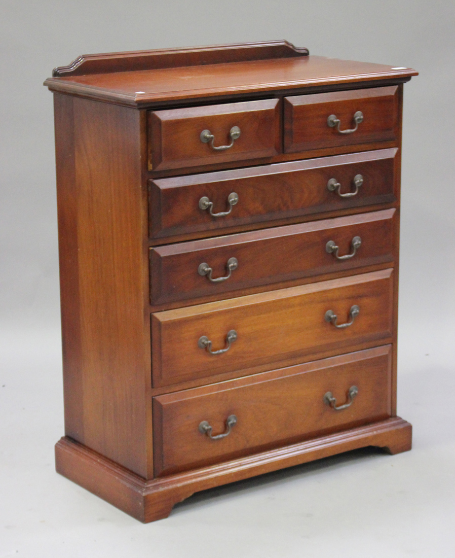 A 20th century reproduction hardwood bedroom suite, retailed by Harrod's, comprising a chest of - Image 3 of 3