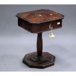 A mid-19th French rosewood work table with overall metal and mother-of-pearl inlaid flowering