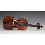 A child's violin bearing interior label marked 'Medio-Fino', length of back excluding button 26.6cm,